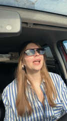 Woman in striped shirt observed in car in Izhevsk