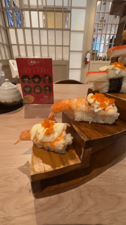 Early morning dining documented at Kuta sushi restaurant