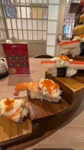 Early morning dining documented at Kuta sushi restaurant