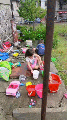 Family life documented in Bulgarian village garden scenes