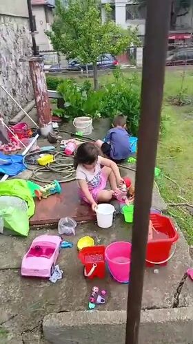 Family life documented in Bulgarian village garden scenes