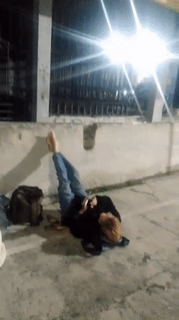 Overnight scenes of people sleeping outside in Caracas
