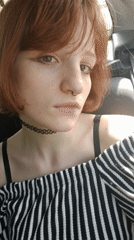 Woman photographed smiling in car in Bistrice, Montenegro