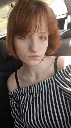 Woman photographed smiling in car in Bistrice, Montenegro