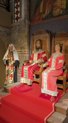 Tourist explores medieval museum exhibits in Veliko Tarnovo, Bulgaria