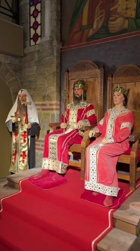 Tourist explores medieval museum exhibits in Veliko Tarnovo, Bulgaria