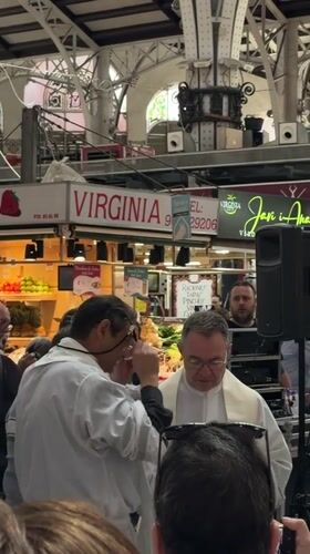 Morning scenes captured at Valencia's historic Mercat Central food market