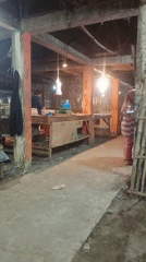 Karawang night market buzzing with produce vendors and activity