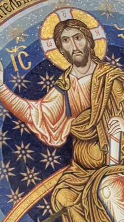 Ornate orthodox church interior in Belgrade, opening on mosaic