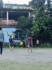 Pickup football on a dirt field in Kabirhat, Bangladesh