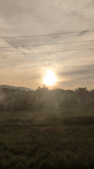 Rural roads and smoky fields in Tu Vũ, Vietnam