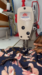 Sewing session in Ado, Nigeria, working through patterned fabrics