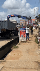 Crane truck spotted on Lagos street during daytime operations