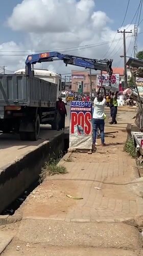 Crane truck spotted on Lagos street during daytime operations