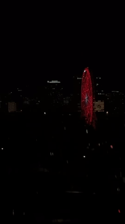 Red Ferris wheel lights up Mexico City night skyline