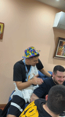 Four men celebrate with cheese and drinks in Bulgaria