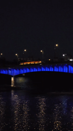 Warsaw's Vistula riverfront glows at dusk