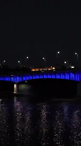 Warsaw's Vistula riverfront glows at dusk