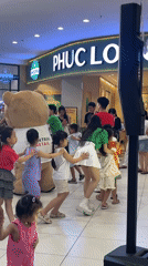 Bear mascots entertain families at Vietnam shopping mall