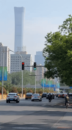 Morning bicycle commute documented in Beijing's business district
