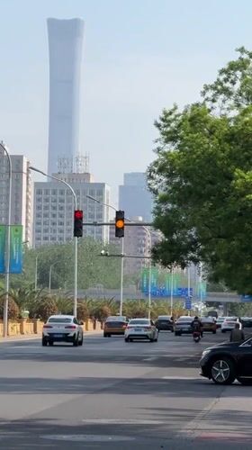 Morning bicycle commute documented in Beijing's business district