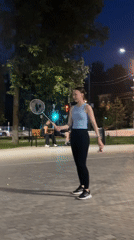 Late-night badminton practice under the streetlights in Krasnogorsk