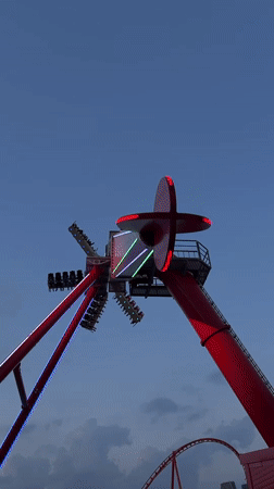 Moscow amusement park rides in action, August evening