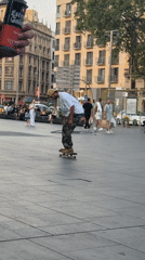 Skateboarders gather for evening session in Barcelona plaza