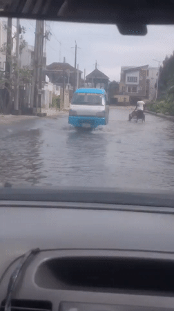 Flooding and rough seas hit Lagos neighborhoods on a July morning