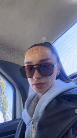 Woman in sunglasses observed in vehicle in Belorechensk