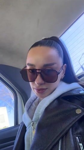 Woman in sunglasses observed in vehicle in Belorechensk