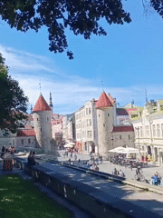 Tallinn's Viru Gate and Old Town on a busy summer morning