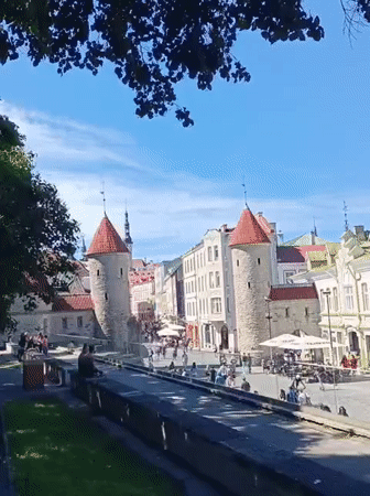 Tallinn's Viru Gate and Old Town on a busy summer morning
