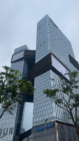 Twin tower building with glass exterior documented in Nanshan