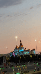Castle-like building illuminated at dusk in Sirius, Russia