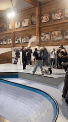 Skateboarding awards ceremony celebrated with champagne at French indoor park
