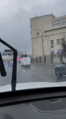 Morning rain creates wet driving conditions on Moscow highway
