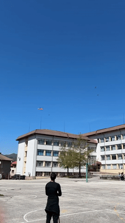 Helicopter flies over outdoor court in Zlatograd, Bulgaria