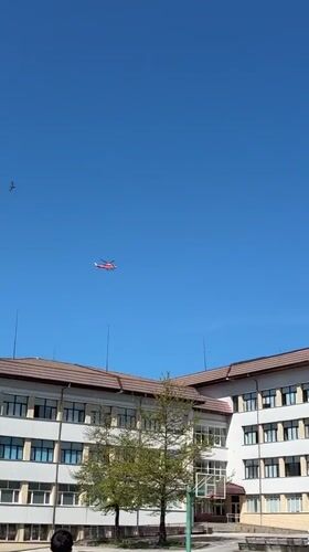 Helicopter flies over outdoor court in Zlatograd, Bulgaria
