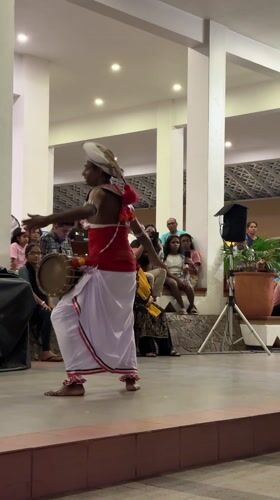 Traditional drummer performs for audience in Kudamaduwella, Sri Lanka