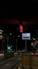 Nighttime tram journey documented through urban area May 9
