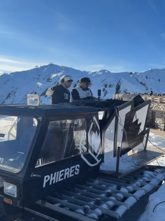 DJs perform mountain-top snow party on Austrian alpine slopes