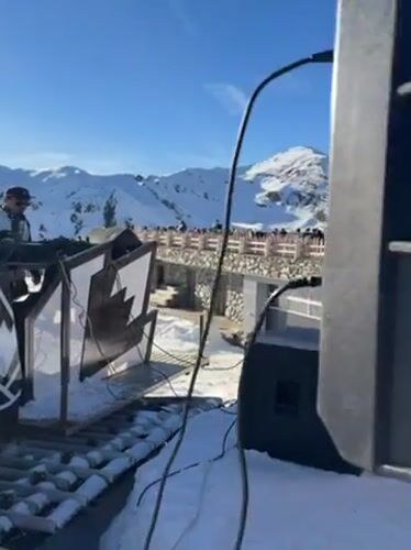 DJs perform mountain-top snow party on Austrian alpine slopes