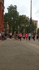 Dance fitness class draws crowd at Barcelona's Arc de Triomf