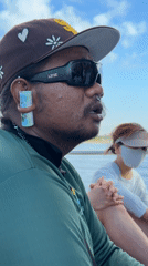 Man with unusual ear accessory spotted on boat in Indonesia