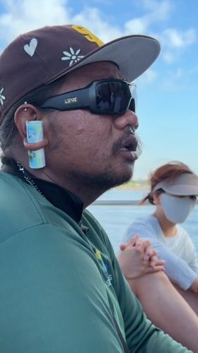 Man with unusual ear accessory spotted on boat in Indonesia