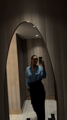 Woman Takes Multiple Mirror Selfies in Budva Hotel