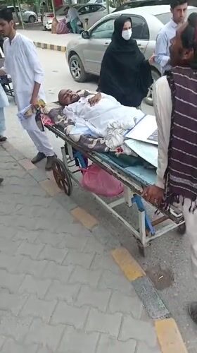 Hospital stretcher, pedestrian activity recorded in Peshawar morning