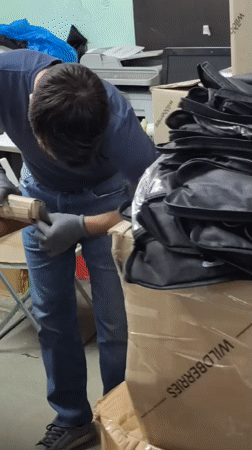 Moscow warehouse workers conduct routine operations during morning shift