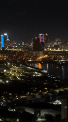 Aerial night views of Đà Nẵng's illuminated skyline and river